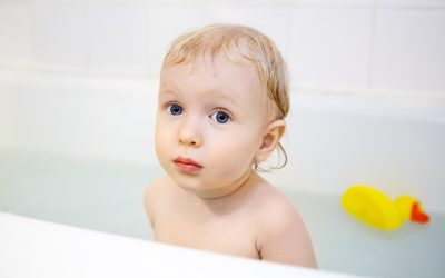 baby bathing in hot water