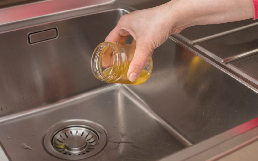 dangers of pouring oil down kitchen drain